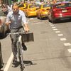 Photo: Posh, Espresso-Sipping Cyclist Shows Us How To Roll Against Traffic In Style